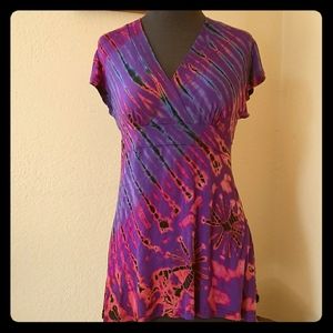 Clea Ray V-neck, colorful tie-dye knit top.